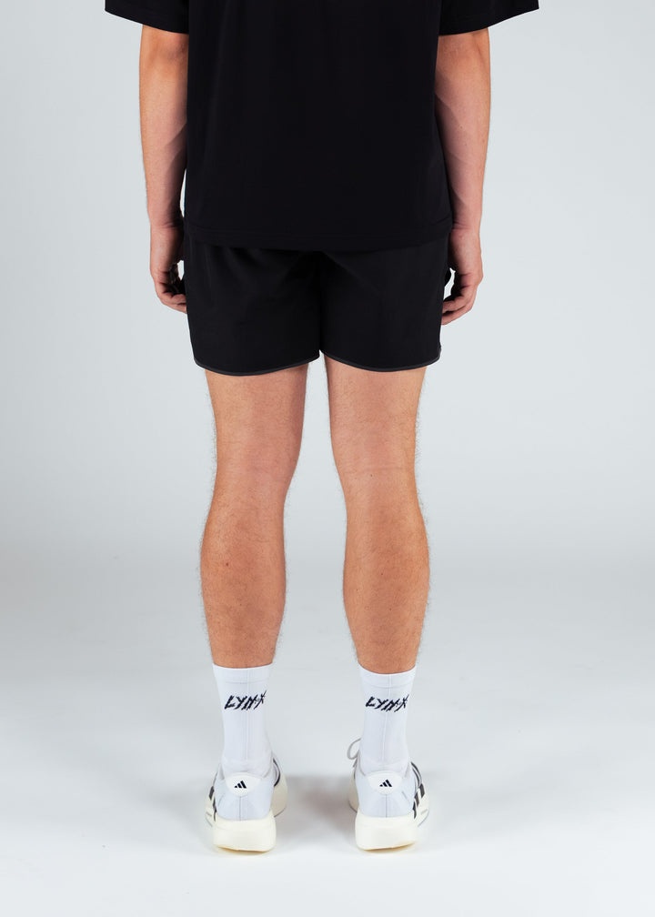 person wearing we train for him tee