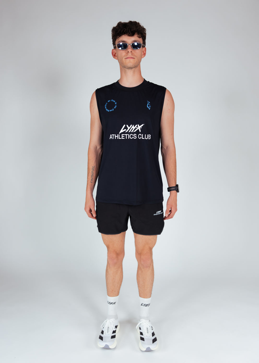 person wearing lynx athletics club race outfit