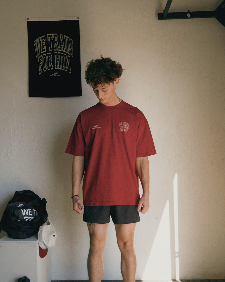 model wearing christian gym tee we train for him graphic