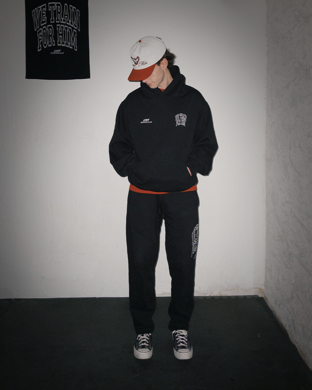 model wearing we train for him gym set